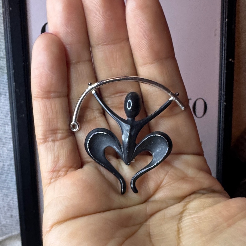 Elegant Black and Silver Brooch